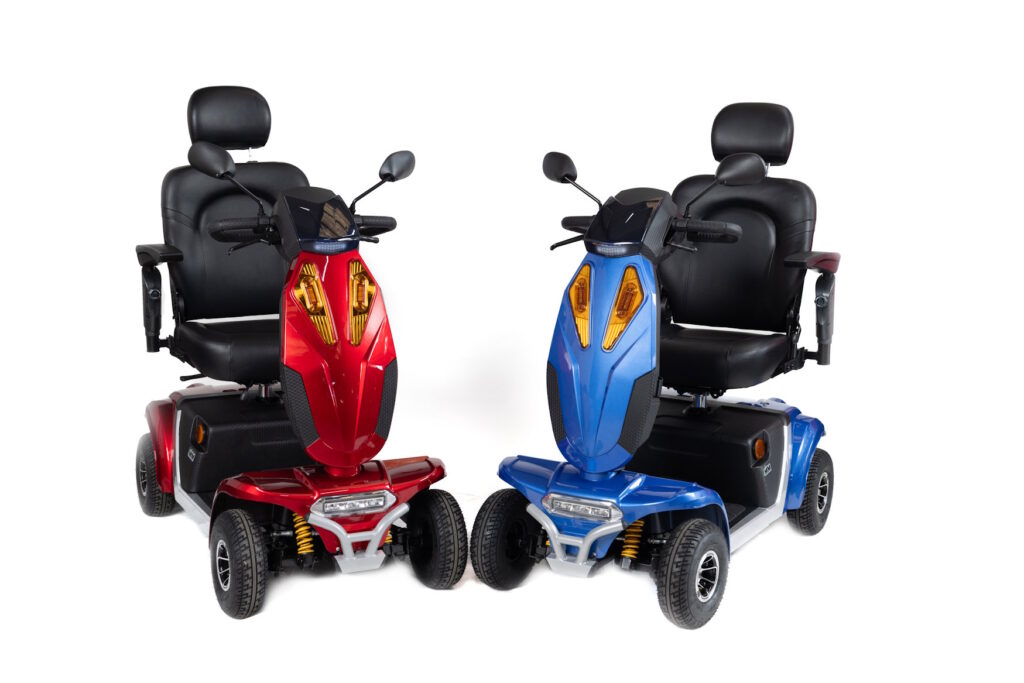A red and a blue Vogue sport mobility scooter
