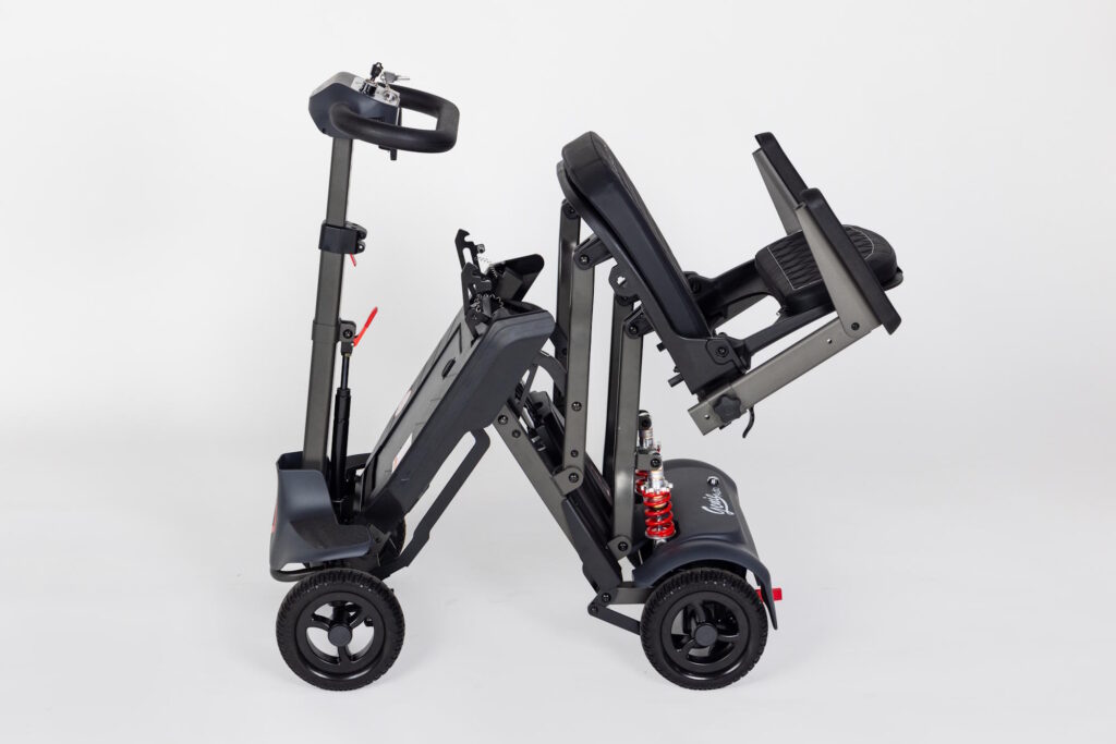 A Genie Auto mobility scooter mid fold