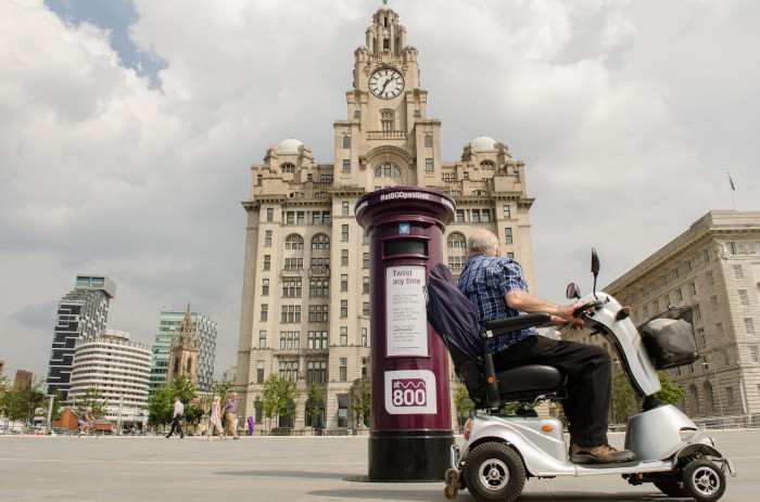 Man on a mobility scooter out in the street