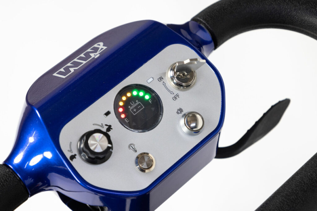 Close-up of the console on the Genie mobility scooter showing the battery is fully charged
