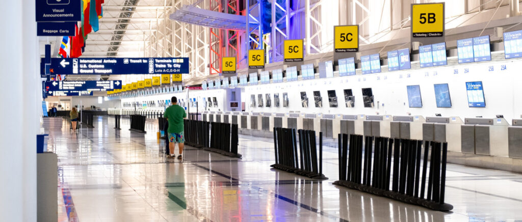 Inside of an airport by the check in desks