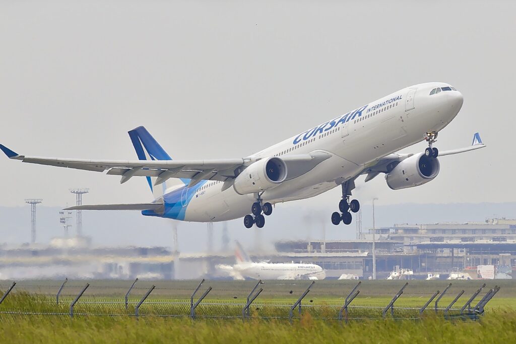 A plane taking off from the runway