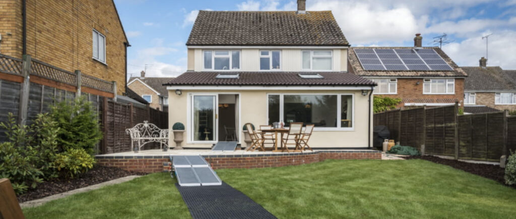 House with mobility ramp leading up to it